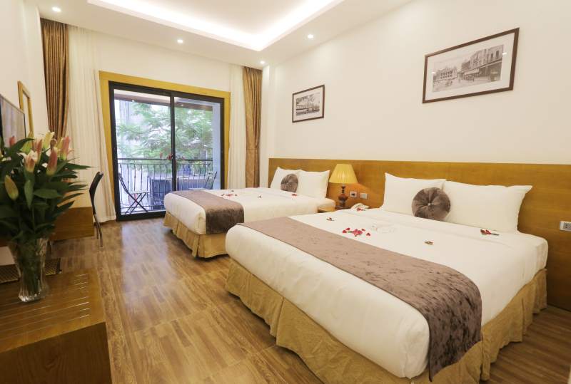 Family Hanoi Hotel - Deluxe Balcony Family Room With 1 Extra Bed
